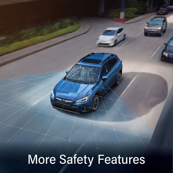 A Subaru Crosstrek in blue with the words &ldquo;More Safety Features&ldquo;. | Goldstein Subaru in Colonie NY