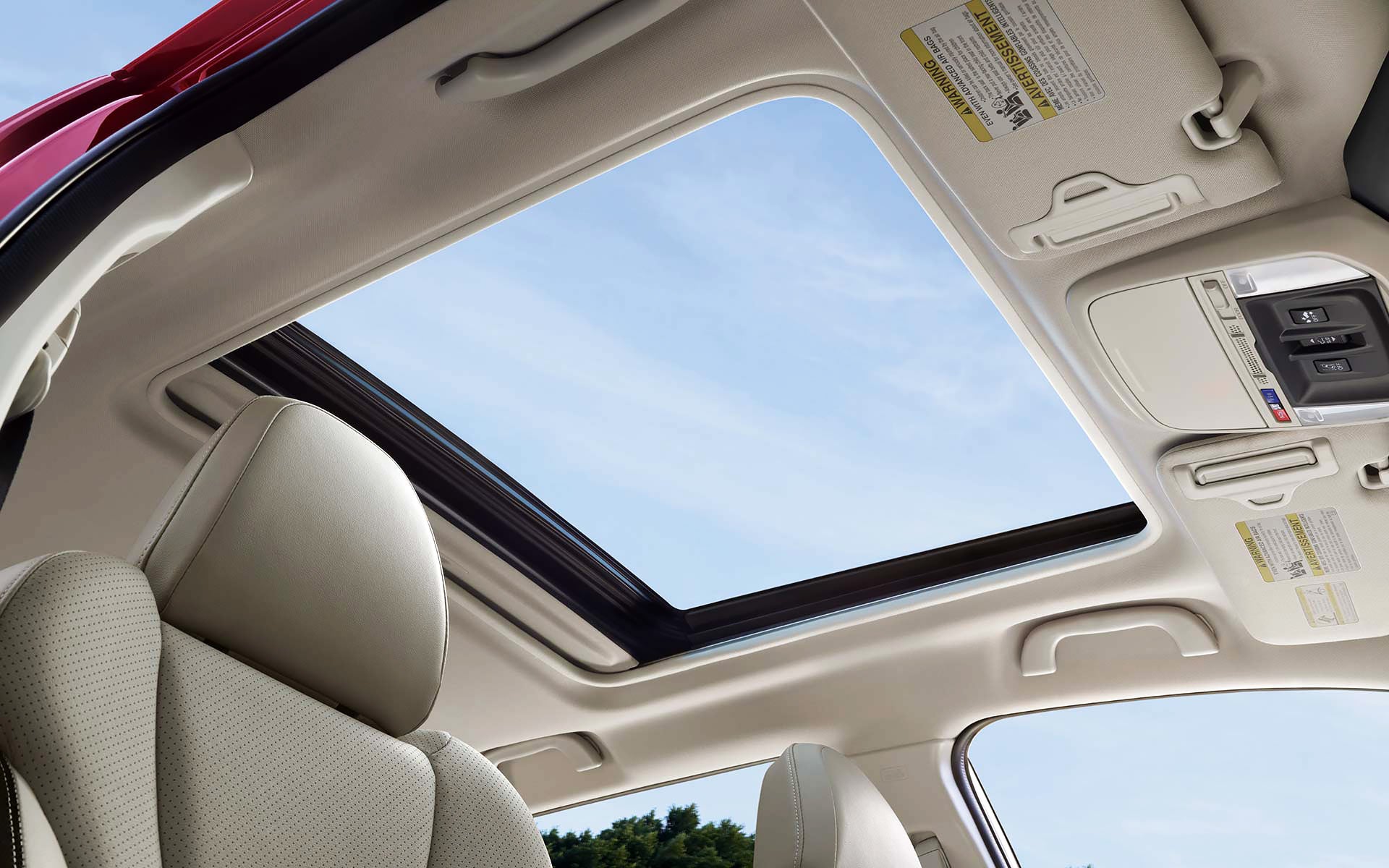 A view through the power sliding panoramic moonroof on the 2022 Forester Sport. | Goldstein Subaru in Colonie NY