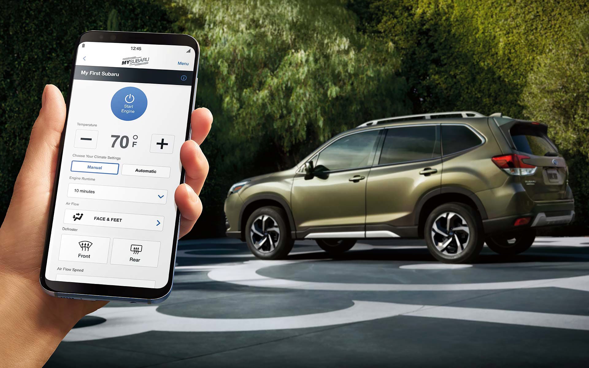 A close-up of a phone showing the Remote Engine Start with Climate Control feature of SUBARU STARLINK® Safety and Security available on the 2022 Forester. | Goldstein Subaru in Colonie NY