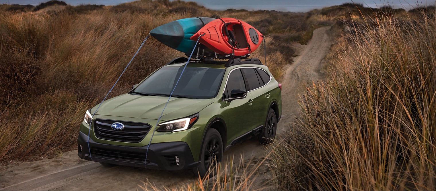 2022 Subaru Outback with roofrack and canoes